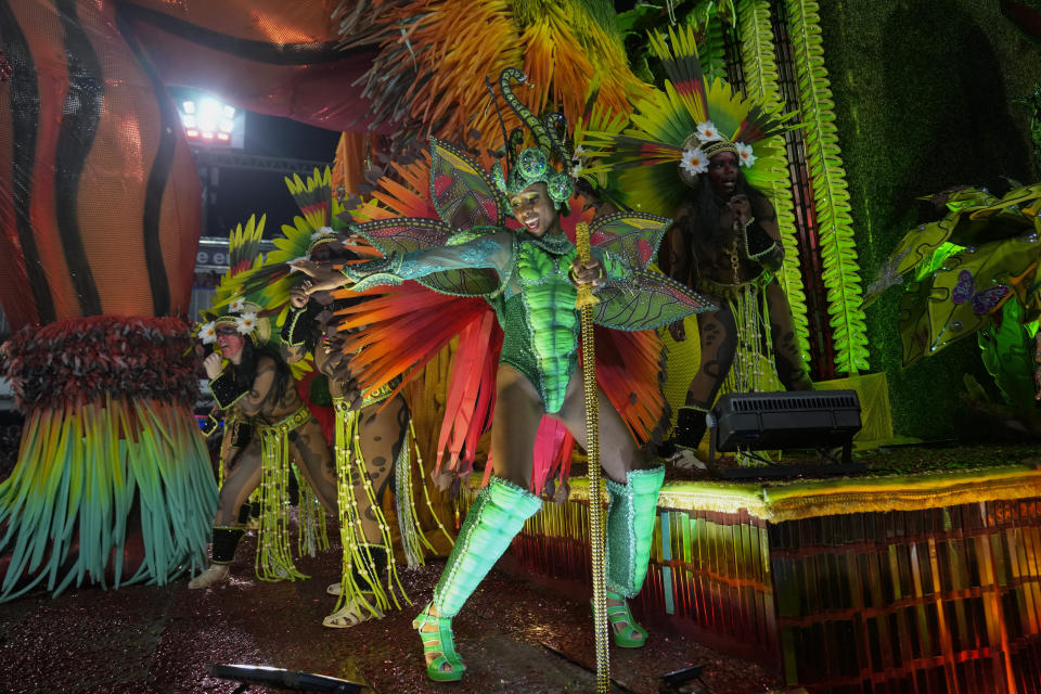 Performers from the Salgueiro samba school parade on a float during Carnival celebrations at the Sambadrome in Rio de Janeiro, Brazil, early Monday, Feb. 12, 2024. (AP Photo/Silvia Izquierdo)