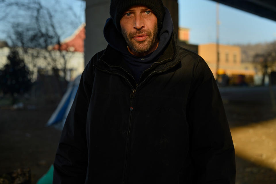 Gene settles in for the night at a tent encampment in December.<span class="copyright">Rebecca Kiger</span>