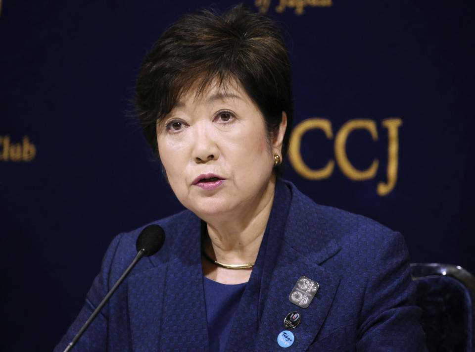 FILE - In this Feb. 18, 2019, file photo, Governor of Tokyo Yuriko Koike speaks during a press conference in Tokyo. Sapporo officials are thrilled with a proposal to move next year's Tokyo Olympic marathons to the northern Japanese city to avoid the summer heat in the city. Governor Koike was not overjoyed on Thursday, Oct. 17. "We are very surprised to learn of this sudden change of direction," she said, noting the effort that municipal governments had made to organize the race. (AP Photo/Koji Sasahara, File)