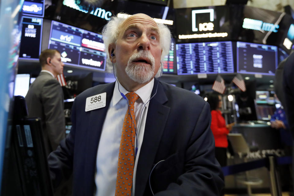 Trader Peter Tuchman works on the floor of the New York Stock Exchange, Tuesday, Oct. 2, 2018. (AP Photo/Richard Drew)