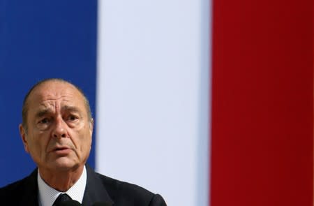 FILE PHOTO: France's President Jacques Chirac delivers a speech as he presides over a French citizen naturalizat..