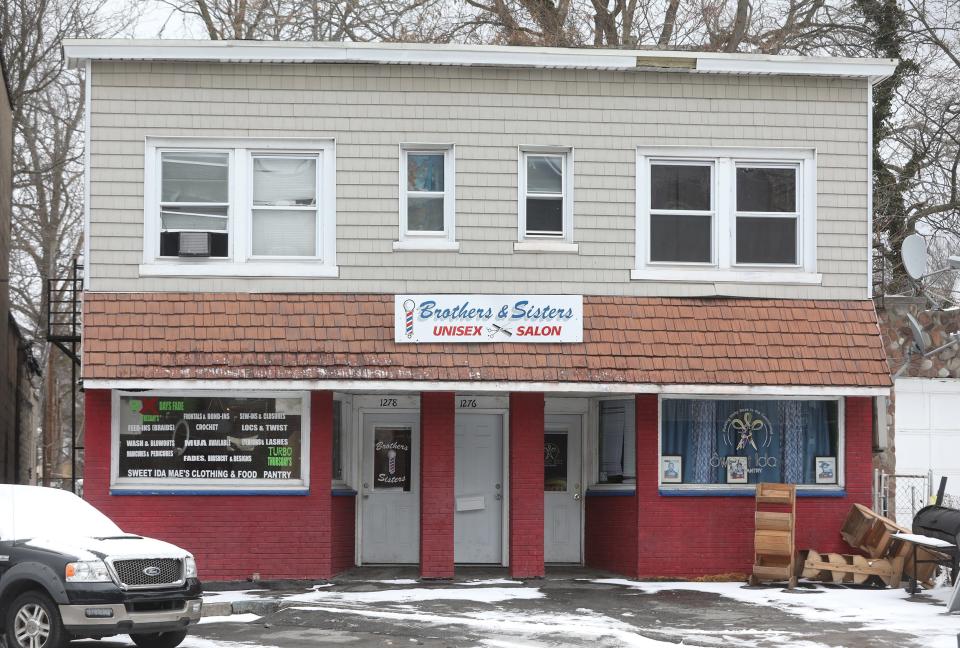 Community Resource Collaborative bought this building in August 2023. It houses a barbershop and clothing and food pantry operated by an employee and former board member, Devon Reynolds.