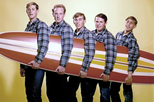 <p>Michael Ochs Archives/Getty</p> (L-R) Brian Wilson, Mike Love, Dennis Wilson, Carl Wilson and David Marks in August 1962