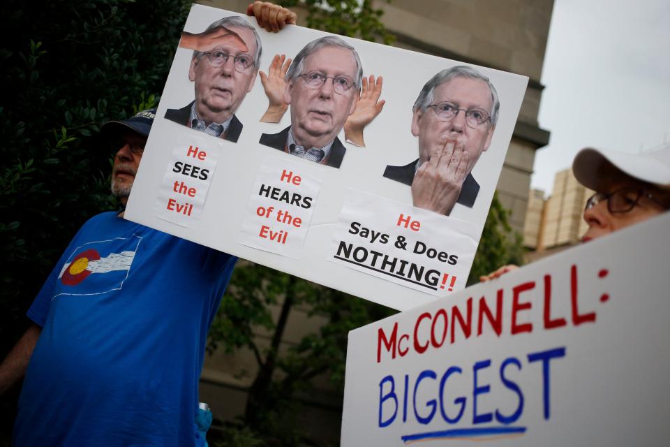 In reaction to the mass shootings in El Paso, Texas, and Dayton, Ohio, protesters convened outside Senate Majority Leader Mitch McConnell's (R-Ky.) office on August 6, 2019 in Louisville, Ky.