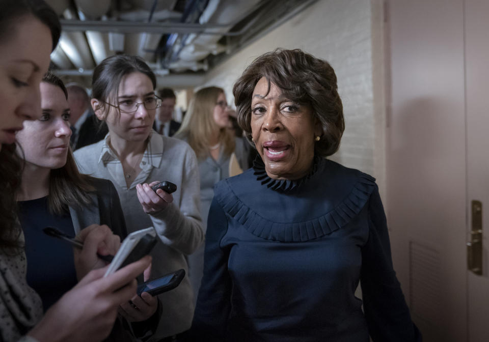 Rep. Maxine Waters, D-Calif., chair of the House Committee on Financial Services, is asked by reporters about comments by Rep. Rashida Tlaib, D-Mich., who used profanity to describe President Donald Trump and call for his impeachment, at the Capitol in Washington, Friday, Jan. 4, 2019. (AP Photo/J. Scott Applewhite)