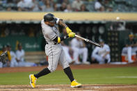 Chicago White Sox's Yoán Moncada hits a three-run home run against the Oakland Athletics during the second inning of a baseball game in Oakland, Calif., Thursday, Sept. 8, 2022. (AP Photo/Godofredo A. Vásquez)