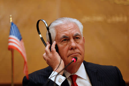 U.S. Secretary of State Rex Tillerson listens to the translation during a news conference with Jordanian Foreign Minister Ayman Safadi in Amman, Jordan February 14, 2018. REUTERS/Muhammad Hamed/Files