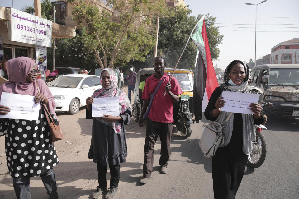 People chant slogans during a protest in Khartoum, amid ongoing demonstrations against a military takeover in Khartoum, Sudan, Thursday, Nov. 4, 2021. (AP Photo/Marwan Ali)