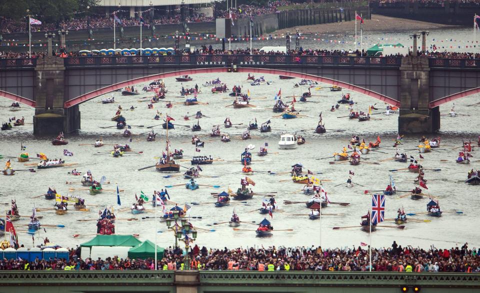 Like a scene from a Canaletto painting, paddle boats take part in this year's Thames Diamond Jubilee River Pageant. The event saw a flotilla of a 1,000 boats accompanying the royals down the Thames.
