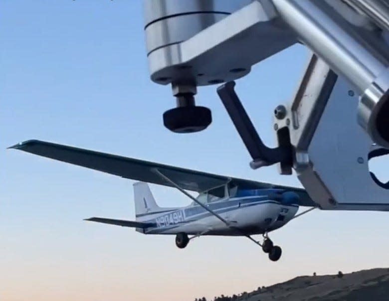 This photo of a Cessna plane flying dangerously close to a boat on Horsetooth Reservoir on Sept. 11, 2022, was used as evidence to charge the pilot with  menacing and reckless endangerment.