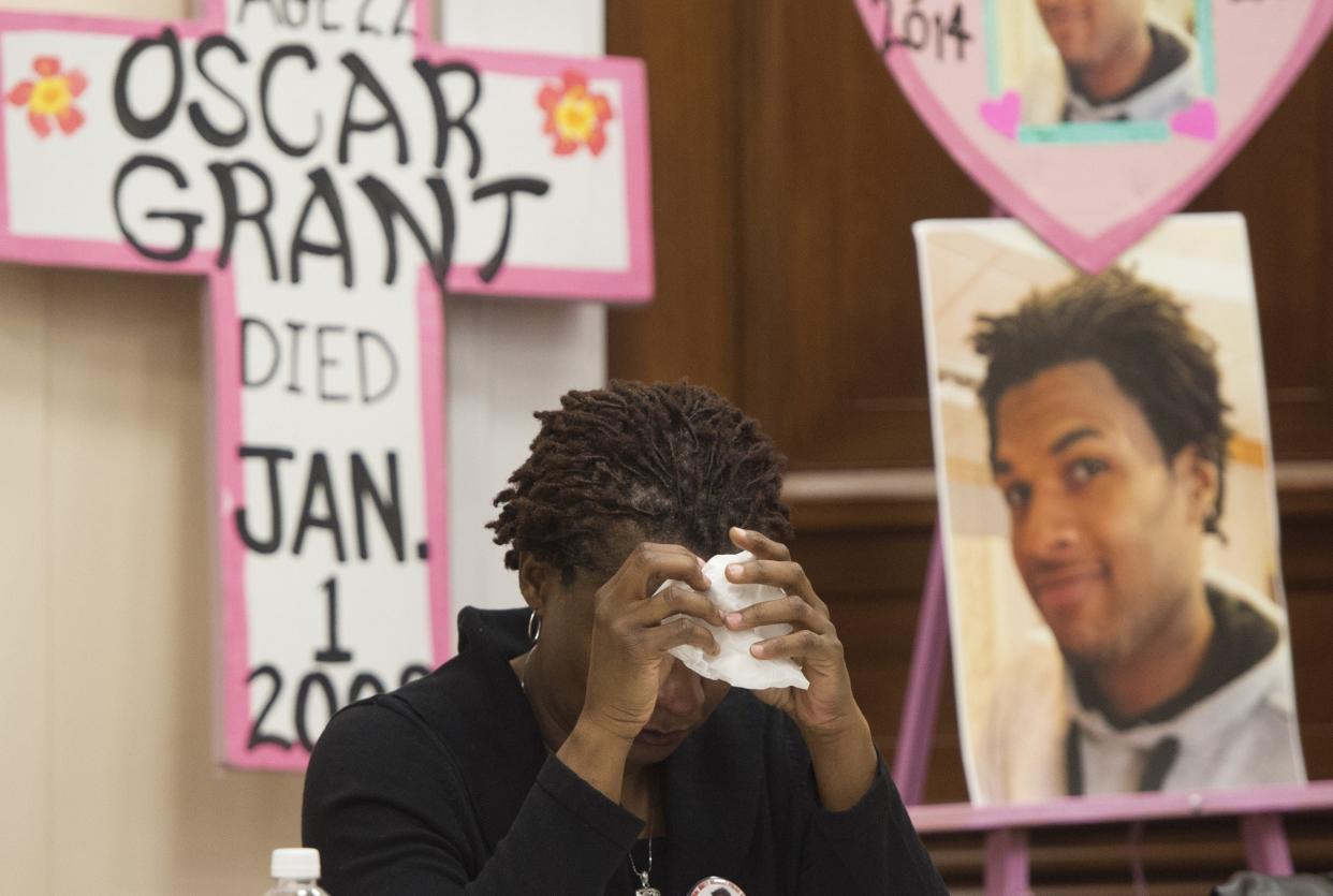 Tressa Sherrod cries after telling the story of her son, 22-year-old John Crawford III, who was shot and killed by police in an Ohio Walmart, Dec. 10, 2014. (Photo: SAUL LOEB via Getty Images)
