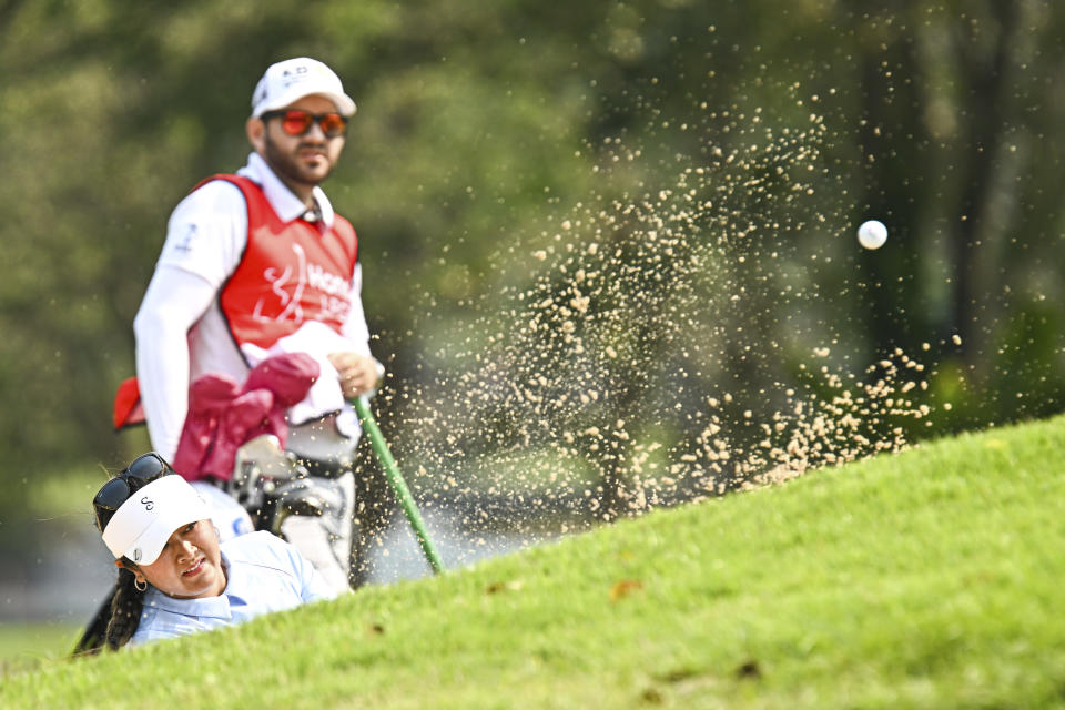 Lilia Vu of the USA watches her shot on the 2nd hole during the final round of the LPGA Honda Thailand golf tournament in Pattaya, southern Thailand, Sunday, Feb. 26, 2023. (AP Photo/Kittinun Rodsupan)