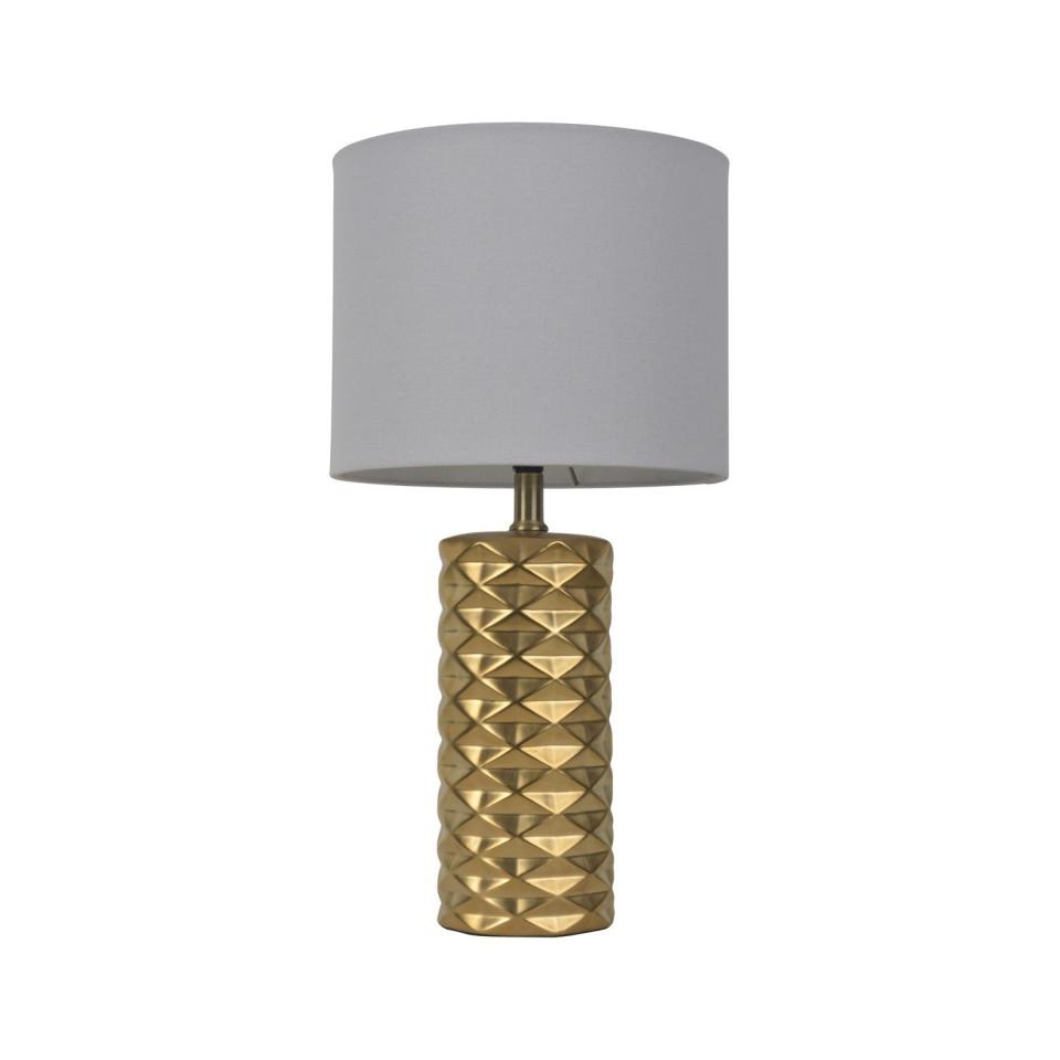 Get it at <a href="https://www.target.com/p/faceted-ceramic-accent-table-lamp-room-essentials-153/-/A-50867158#lnk=newtab&amp;preselect=50598663" target="_blank">Target, $25</a>.