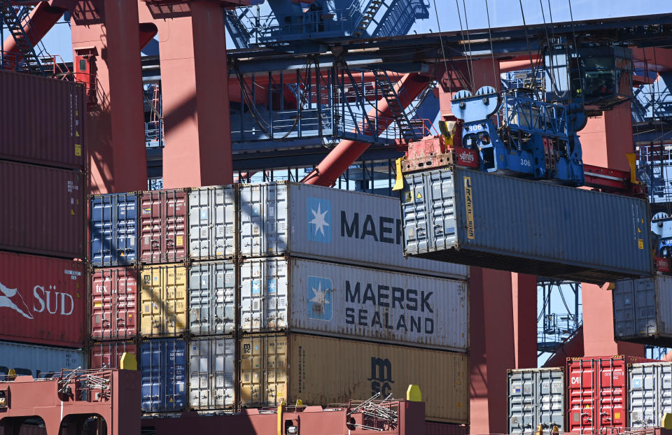 HAMBURG, GERMANY - MAY 06: Workers move containers at Hamburg Port, Germany's biggest container port, on May 6, 2020 in Hamburg, Germany. The economic forecast for the Eurozone has worsened, due to consequences of the novel coronavirus Covid-19 pandemic, with the European Commission predicting a drop of 7.75% in EU-wide economic output for the year. The Commission expects a strong rebound for 2021. (Photo by Stuart Franklin/Getty Images)