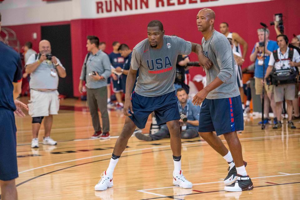 Team USA's Kevin Durant (5) blocks USA assistant coach Monty Williams during a USA basketball practice in 2016.