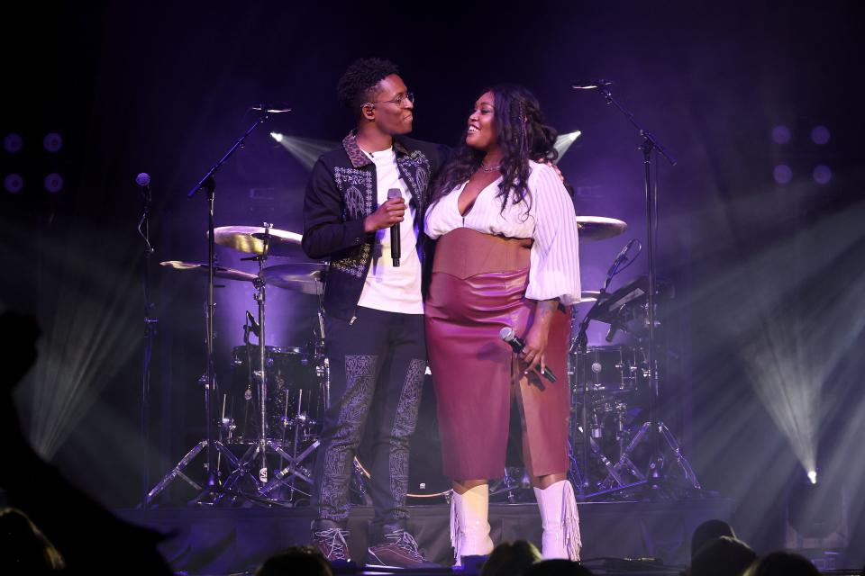 Brittney Spencer and BRELAND perform onstage for "BRELAND & Friends" concert to benefit the Oasis Center, sponsored by Amazon Music at Ryman Auditorium on April 12, 2022 in Nashville, Tennessee. (Photo by Jason Kempin/Getty Images for "BRELAND & Friends" )