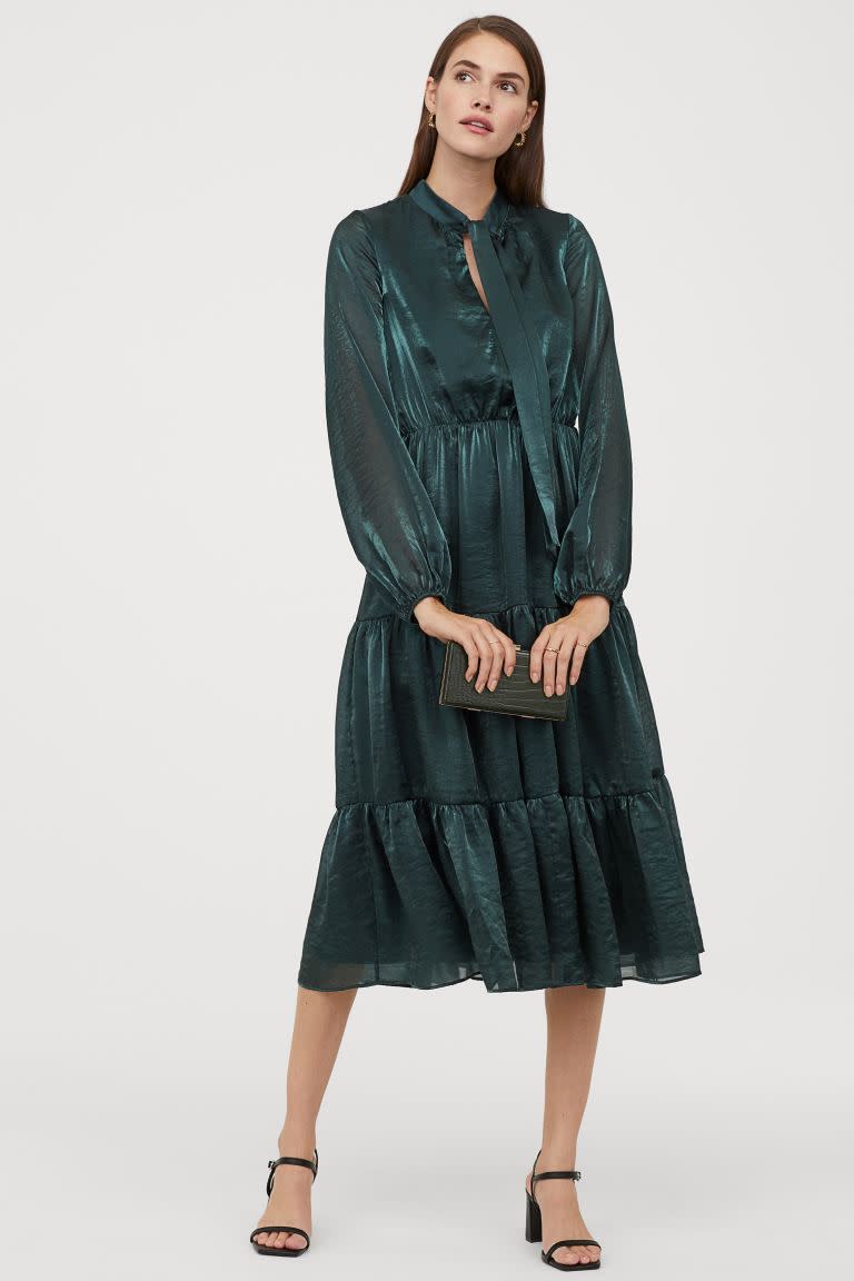 This emerald green look from H&M looks similar to Kate Middleton's shimmering look by The Vampire's Wife, and costs a fraction of the price. (Image via H&M)  