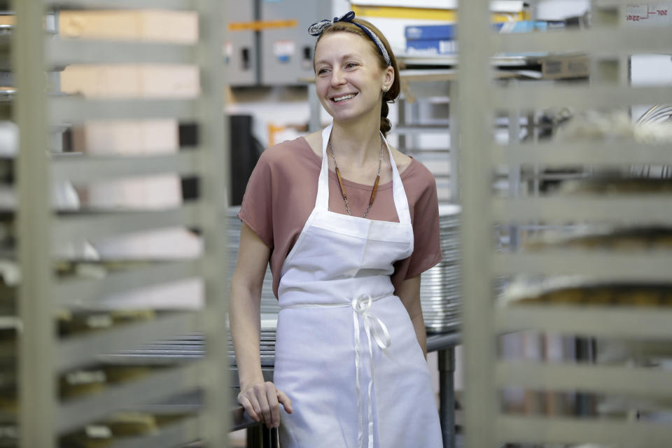 In this Thursday, Feb. 21, 2013 photo, Christina Tosi, pastry chef and founder of Momofuku Milk Bar, poses for a picture at the Milk Bar kitchen in New York. Cereal is going out of the box. Milk, ice cream, muffin mix and more are being infused with the flavor of the classic childhood treat. (AP Photo/Seth Wenig)