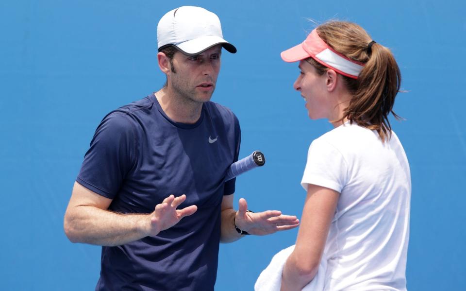 Johanna Konta of Great Britain talks with her coach Esteban Carril in her practice session during day nine of the 2016 Australian Open at Melbourne Park on January 26, 2016 - Darrian Traynor/Getty Images