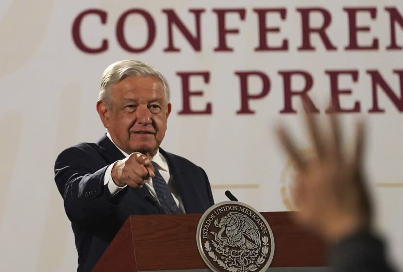 Mexico's President Andres Manuel Lopez Obrador calls on a journalist during his daily press conference at the National Palace, in Mexico City, Wednesday, June 22, 2022. (AP Photo/Marco Ugarte)