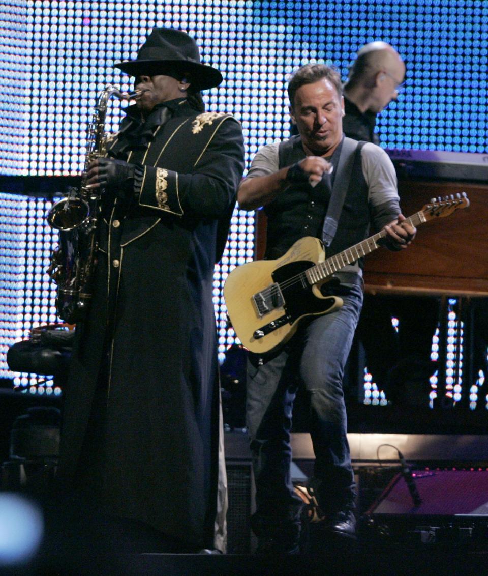 Bruce Springsteen and Clarence Clemons perform in 2009 with the E Street Band during the final concert at Giants Stadium in East Rutherford.