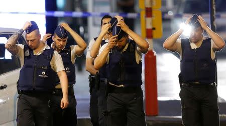 Belgian police take up position following an explosion at Central Station in Brussels, Belgium, June 20, 2017. REUTERS/Francois Lenoir