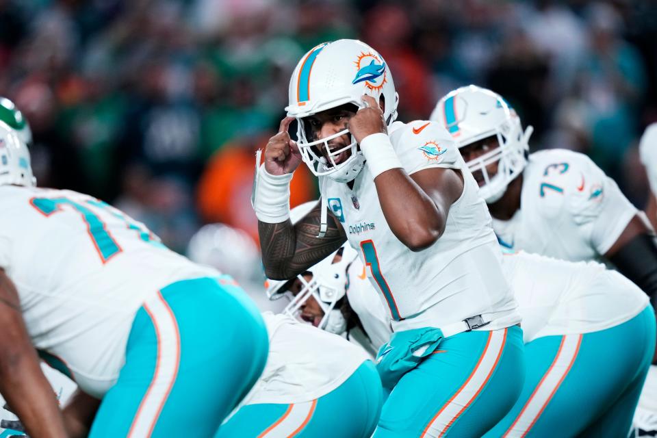 Miami Dolphins quarterback Tua Tagovailoa (1) gestures during the first half of an NFL football game against the Philadelphia Eagles on Sunday, Oct. 22, 2023, in Philadelphia. (AP Photo/Matt Slocum)