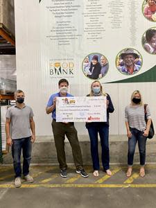 From left to right: Groundwork Coffee CEO Kenny Cola; Food Bank President and CEO Michael Flood; NorthStar Moving Co-Founder Laura McHolm; Gillan Abercrombie Frame from Compass Real Estate