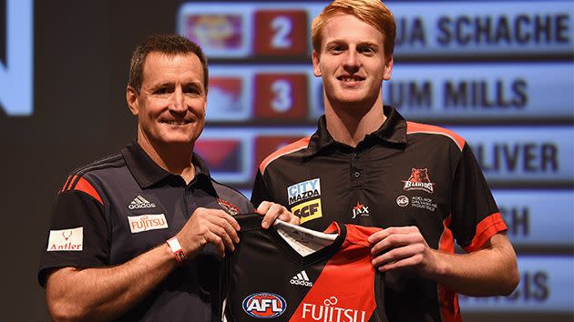 Francis with Essendon coach John Worsfold after being drafted. Image: Getty