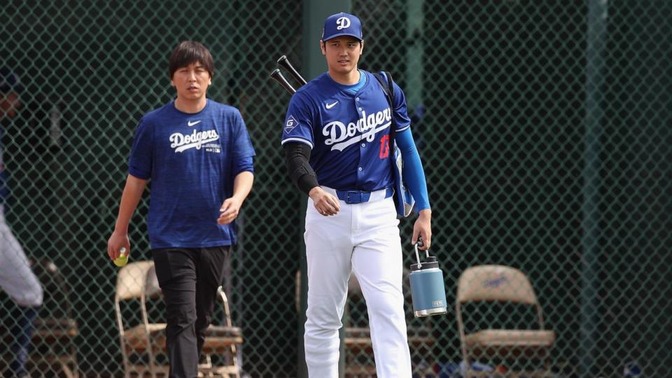 PHOTO: Shohei Ohtani #17 of the Los Angeles Dodgers and interpreter Ippei Mizuhara arrive to a game against the Chicago White Sox at Camelback Ranch Feb. 27, 2024 in Glendale, Arizona. (Christian Petersen/Getty Images)