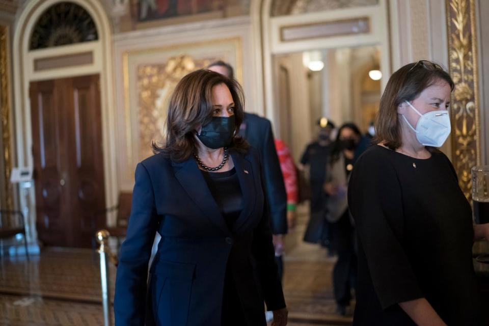 Vice President Kamala Harris arrives to break the tie on a procedural vote as the Senate works on the Democrats' $1.9 trillion COVID relief package, on Capitol Hill in Washington, Thursday, March 4, 2021.
