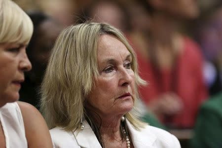 June Steenkamp (R), mother of Reeva Steenkamp, reacts during the verdict in the trial of Olympic and Paralympic track star Oscar Pistorius (unseen) at the North Gauteng High Court in Pretoria September 12, 2014. REUTERS/Alon Skuy/Pool