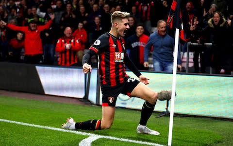 David Brooks of AFC Bournemouth celebrates after he scores his sides first goal during the Premier League match between AFC Bournemouth and Crystal Palace - Credit: GETTY IMAGES