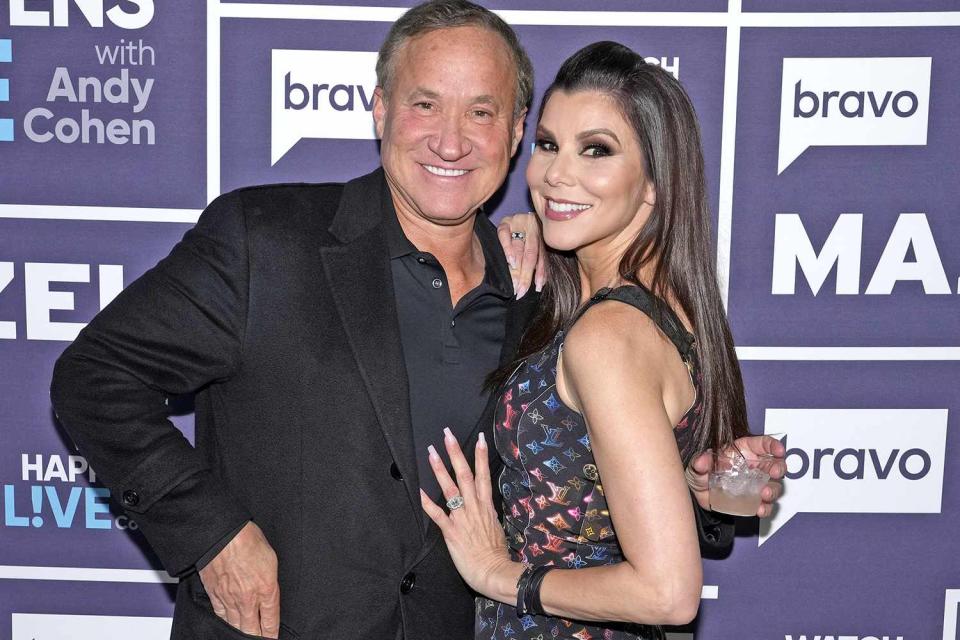 Charles Sykes/Bravo Terry and Heather Dubrow