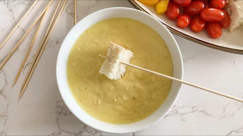 cheese fondue with veggies and bread