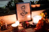 People gather to mourn the death of Associate Justice Ruth Bader Ginsburg at the Supreme Court in Washington