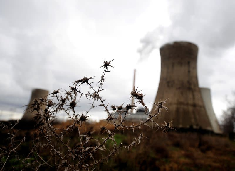 FILE PHOTO: Steam billows from the cooling towers of a coal power plant near the southern town of Bitola