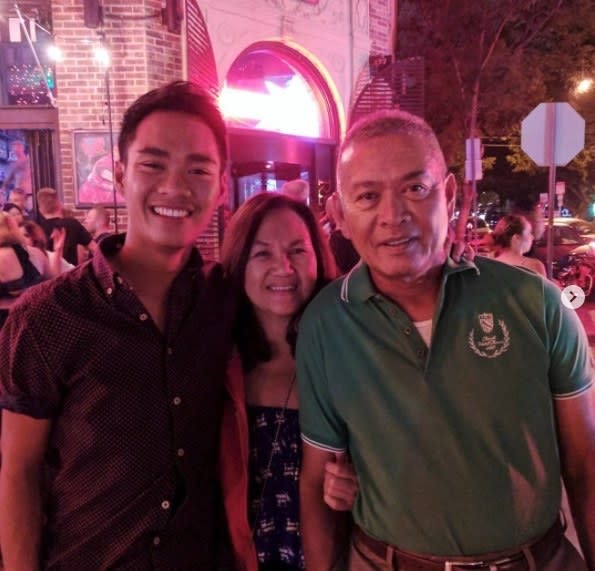 author with his parents at a gay bar