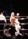 <p>The Heavy Weigh Champion “Nature Boy” Rick Flair enters the ring with J.J. Dillon before the Heavy Weight bout against Road Warrior Hawk during the 1988 Bunkhouse Stampede on January 24, 1988 at the Nassau Coliseum in Uniondale, New York. (Photo by B Bennett/Getty Images) </p>