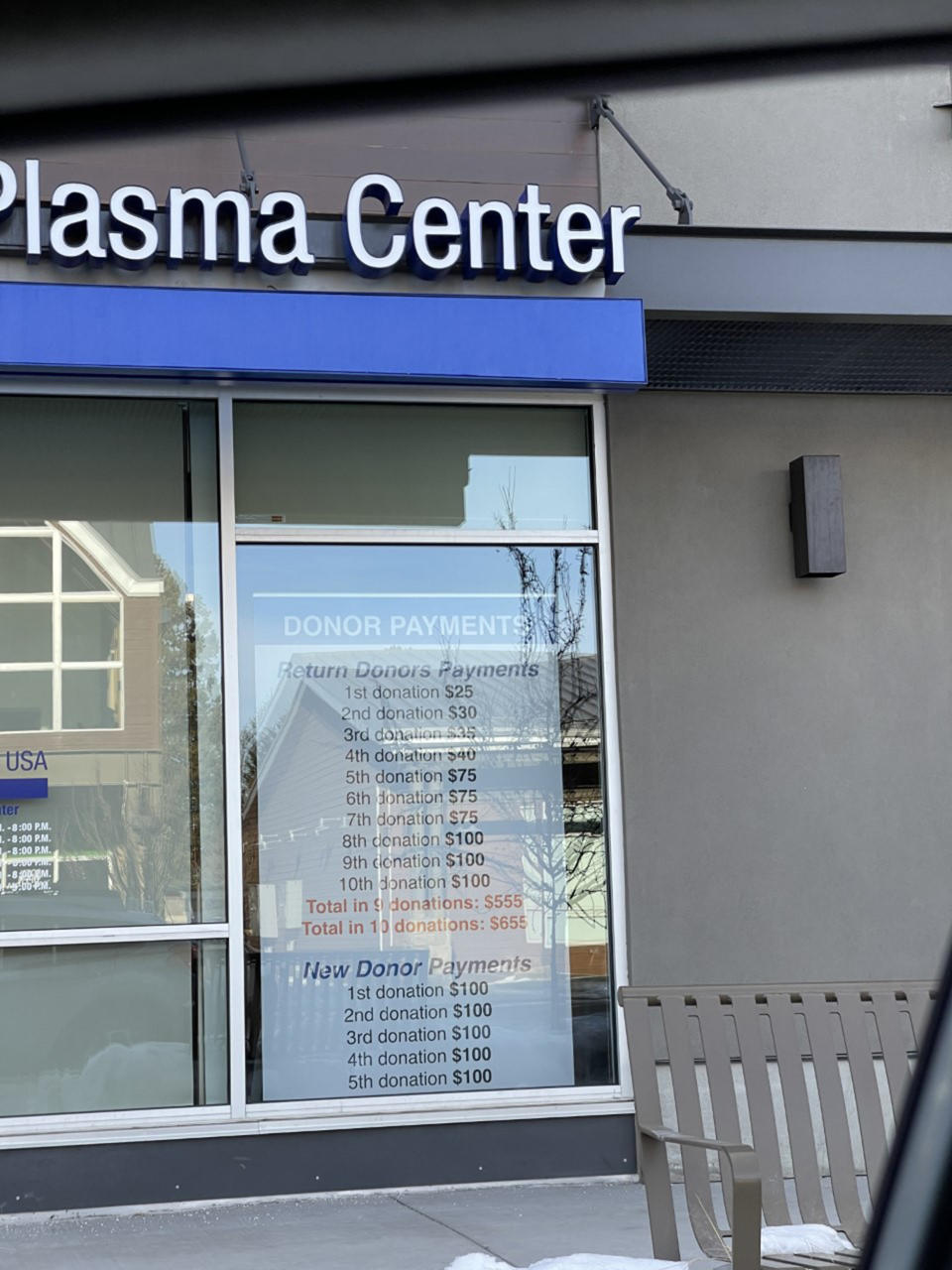 A plasma center in Idaho advertises its payment schedule for donors in the window. 