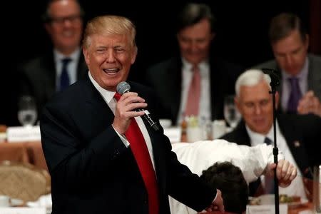 Republican presidential nominee Donald Trump gestures as he speaks to the Economic Club of New York luncheon in Manhattan, New York, U.S., September 15, 2016. REUTERS/Mike Segar