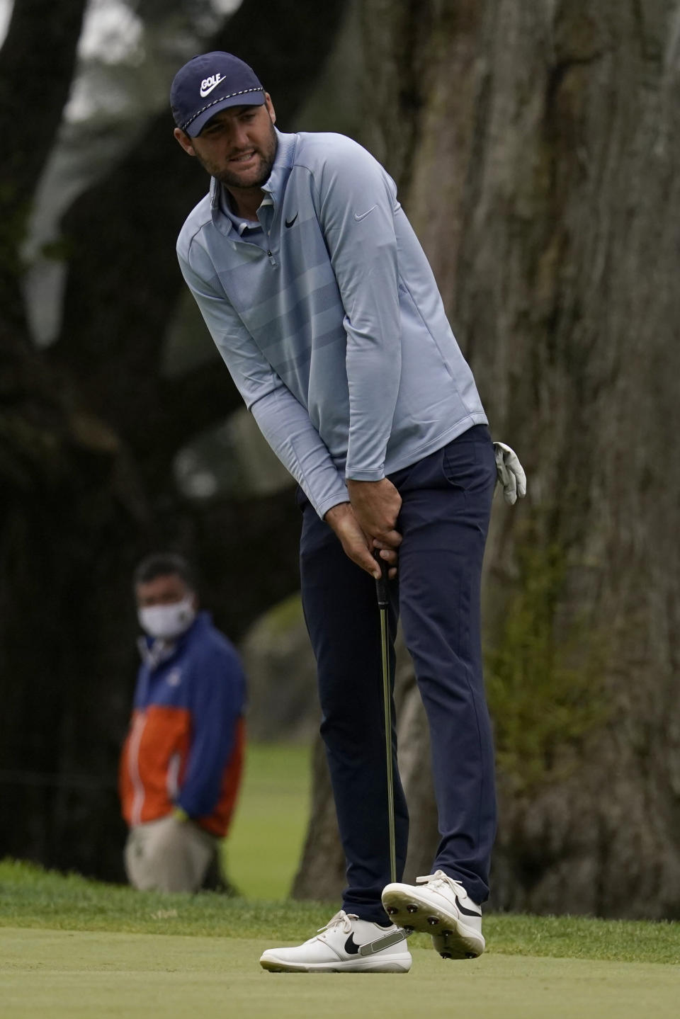 Scottie Scheffler reacts after missing a putt on the second hole during the final round of the PGA Championship golf tournament at TPC Harding Park Sunday, Aug. 9, 2020, in San Francisco. (AP Photo/Jeff Chiu)