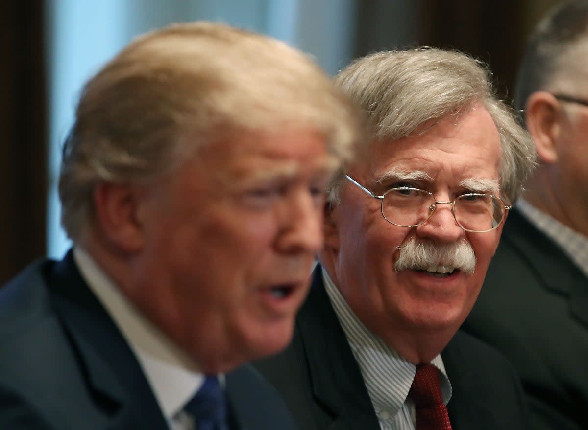 John Bolton, left, with Donald Trump in the White House (Getty Images)