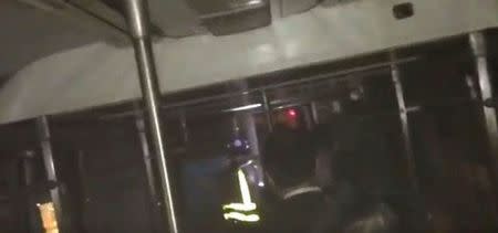 Passengers evacuate from a train in the dark following a subway train incident in the Manhattan borough of New York, United States June 27, 2017, in this still image taken from a video obtained from social media. Twitter/@cutdekProd/via REUTERS