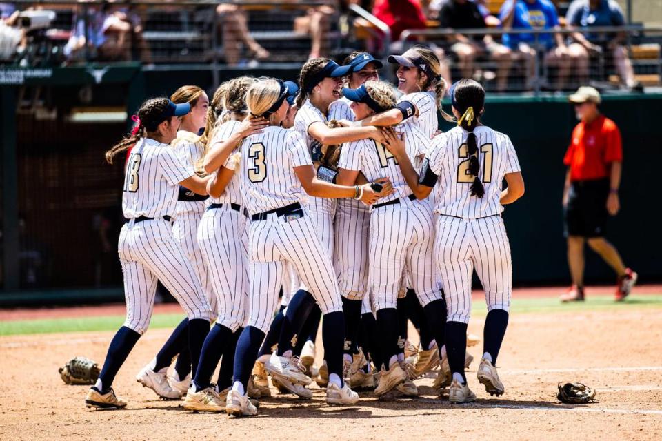 The Montgomery Lake Creek softball team celebrates after the final out and winning the Class 5A state championship against New Braunfels Canyon on Saturday, June 3, 2023, at McCombs Field in Austin, TX. Matthew Smith