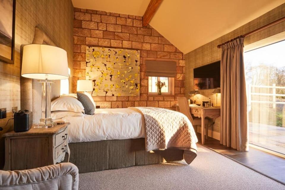 <p>In the pretty riverside village of Ellaston just a nine-minute drive from the Alton Towers Resort, <a href="https://www.booking.com/hotel/gb/the-duncombe-arms.en-gb.html?aid=2070936&label=places-to-stay-near-alton-towers" rel="nofollow noopener" target="_blank" data-ylk="slk:The Duncombe Arms;elm:context_link;itc:0;sec:content-canvas" class="link ">The Duncombe Arms</a> is a charming pub with rooms, plus two self-catering cottages each sleeping up to six. All 10 homely rooms come with artisan wallpaper, indulgent fabrics, coffee machines and supplies of homemade biscuits; two are for families. </p><p>The pub dining has received accolades as some of the best in the country, with bar classics mixed with more adventurous modern British dishes, much of it based on produce from local Dunwood Farm in the heart of the Staffordshire Moorlands.</p><p><a class="link " href="https://www.booking.com/hotel/gb/the-duncombe-arms.en-gb.html?aid=2070936&label=places-to-stay-near-alton-towers" rel="nofollow noopener" target="_blank" data-ylk="slk:BOOK A STAY;elm:context_link;itc:0;sec:content-canvas">BOOK A STAY</a></p>