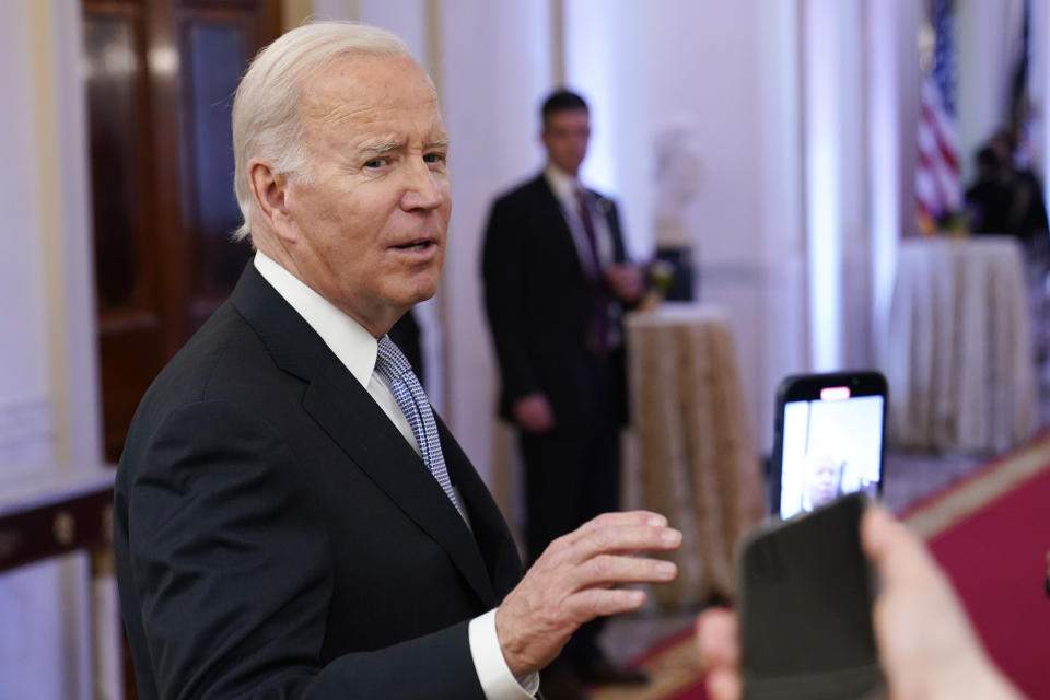 FILE - President Joe Biden talks with reporters after speaking in the East Room of the White House in Washington, Jan 20, 2023. Senior Democratic lawmakers turned sharply more critical Sunday of President Joe Biden's handling of classified materials after the FBI discovered additional items with classified markings at Biden's home. (AP Photo/Susan Walsh, File)