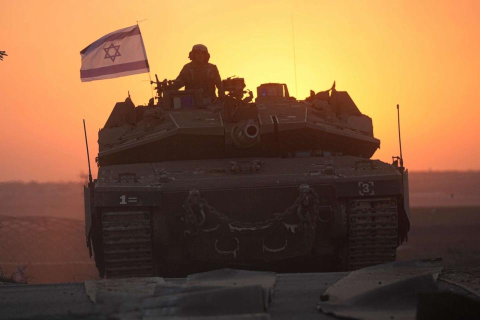 PHOTO: Israeli tanks head towards the Gaza Strip border in southern Israel on Thursday, Oct. 12, 2023. (Ohad Zwigenberg/AP)