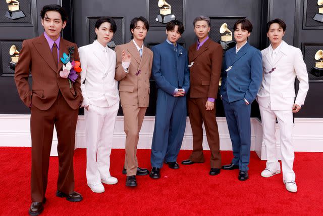 <p>Frazer Harrison/Getty </p> BTS at the 64th Annual GRAMMY Awards at MGM Grand Garden Arena in 2022