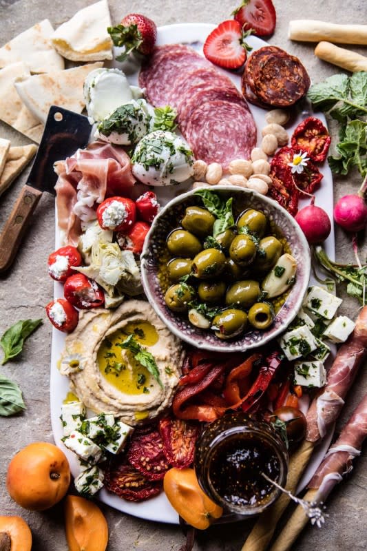 <p>Half Baked Harvest</p><p>A Greek twist on the typical cheese board, this Mediterranean antipasto platter is perfect for Thanksgiving!</p><p><strong>Get the recipe: <a href="https://www.halfbakedharvest.com/mediterranean-antipasto-platter/" rel="nofollow noopener" target="_blank" data-ylk="slk:Mediterranean Antipasto Platter;elm:context_link;itc:0;sec:content-canvas" class="link ">Mediterranean Antipasto Platter</a></strong></p>